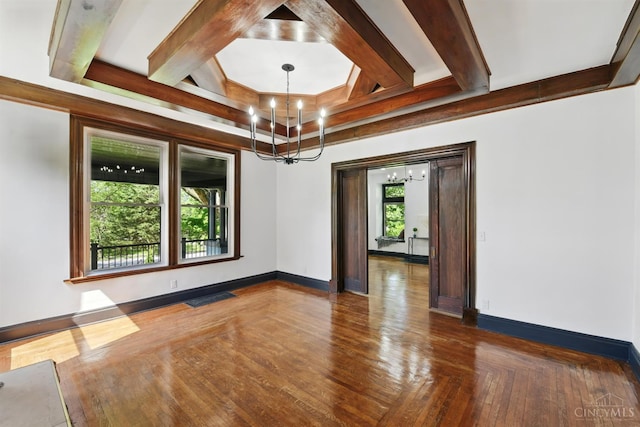 752 S Fred Shuttlesworth Cir, Cincinnati, OH 45229 - spare room with a chandelier, coffered ceiling, baseboards, beam ceiling, and dark wood-style flooring