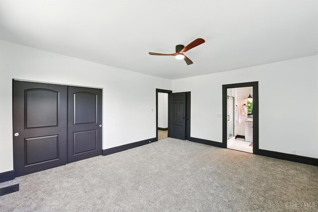 752 S Fred Shuttlesworth Cir, Cincinnati, OH 45229 - unfurnished bedroom with light carpet, baseboards, a ceiling fan, a closet, and connected bathroom