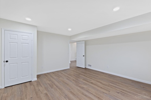 11909 Blackhawk Cir, Springfield Twp, OH 45240 - finished below grade area featuring light wood finished floors, baseboards, and recessed lighting