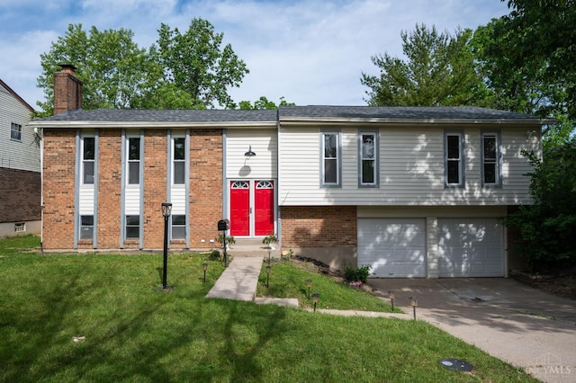 11909 Blackhawk Cir, Springfield Twp, OH 45240 - raised ranch with brick siding, an attached garage, a front yard, a chimney, and driveway