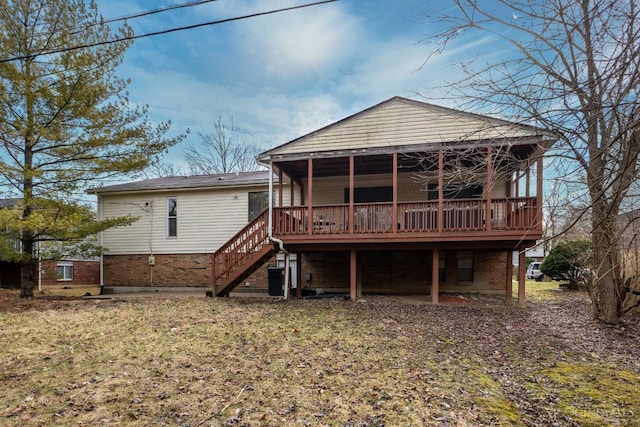 11909 Blackhawk Cir, Springfield Twp, OH 45240 - rear view of house featuring stairway, a deck, and brick siding