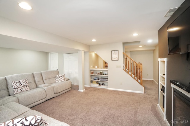 5509 Windmere Dr, Green Twp, OH 45248 - living room with carpet floors, stairway, recessed lighting, and baseboards