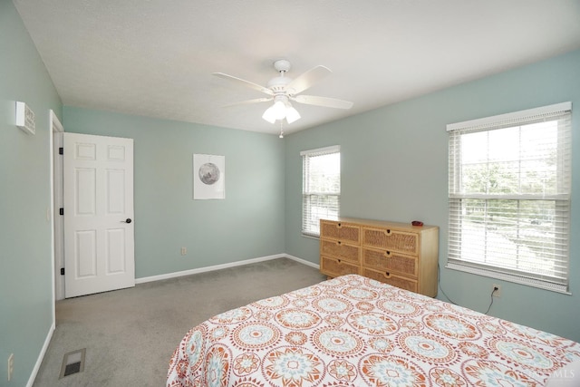 5509 Windmere Dr, Green Twp, OH 45248 - carpeted bedroom featuring baseboards and ceiling fan