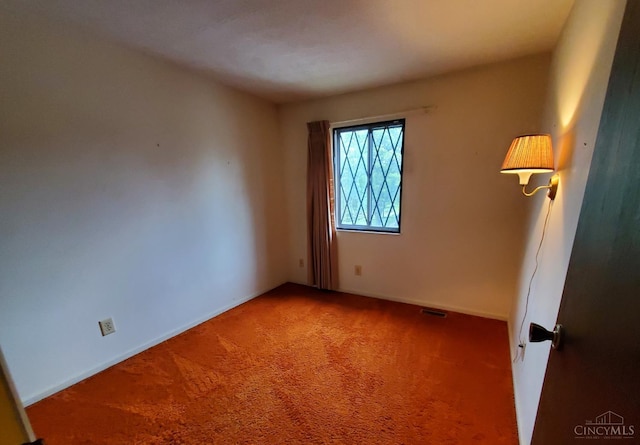 9521 Haddington Ct, Colerain Twp, OH 45251 - spare room featuring carpet flooring and baseboards