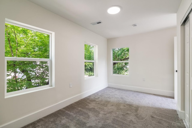 926 Shuler Ave, Hamilton, OH 45011 - spare room featuring carpet, baseboards, and a smoke detector