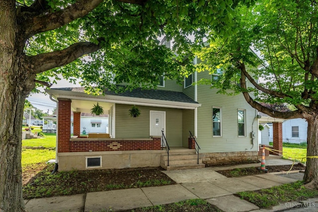 926 Shuler Ave, Hamilton, OH 45011 - view of front of house with brick siding and a shingled roof