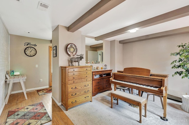 1366 Devils Backbone Rd, Green Twp, OH 45233 - sitting room featuring light wood-style floors, beam ceiling, and baseboards