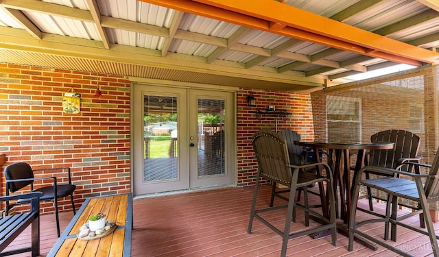 1366 Devils Backbone Rd, Green Twp, OH 45233 - wooden terrace with french doors and outdoor dining area
