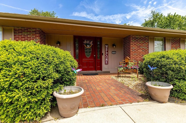 1366 Devils Backbone Rd, Green Twp, OH 45233 - doorway to property featuring brick siding and covered porch