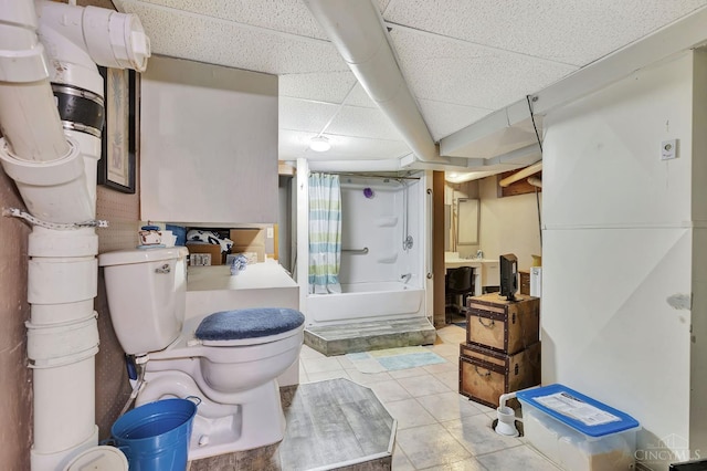 1366 Devils Backbone Rd, Green Twp, OH 45233 - full bath featuring shower / tub combo, toilet, tile patterned flooring, and a paneled ceiling