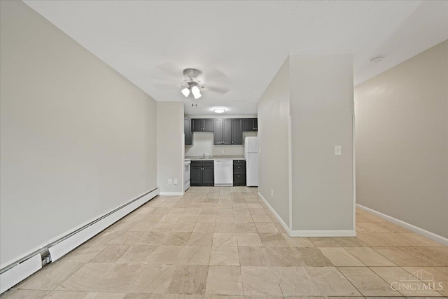 4906 Chalet Dr Unit 7, Saint Bernard, OH 45217 - unfurnished living room with a baseboard radiator and ceiling fan