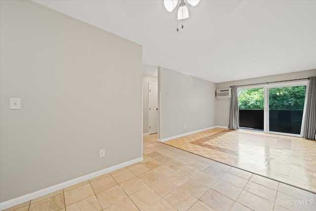 4906 Chalet Dr Unit 7, Saint Bernard, OH 45217 - empty room featuring a ceiling fan, an AC wall unit, and light tile patterned floors