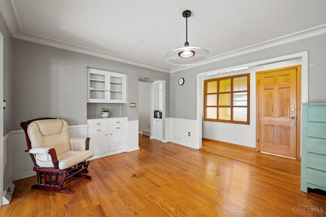 200 Santa Fe Rd, Middletown, OH 45042 - living area with light wood finished floors and ornamental molding