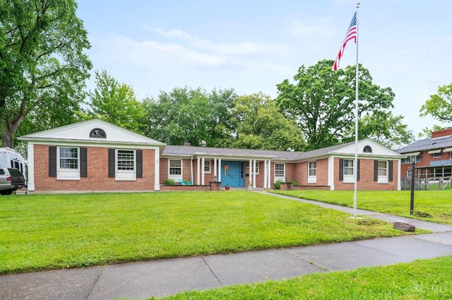 200 Santa Fe Rd, Middletown, OH 45042 - single story home featuring brick siding, a front yard, and covered porch