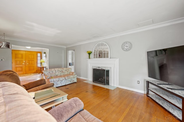 200 Santa Fe Rd, Middletown, OH 45042 - living room featuring ornamental molding, wood finished floors, and a high end fireplace
