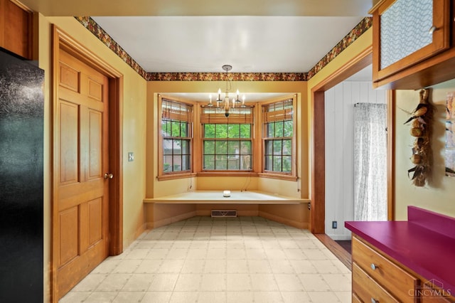200 Santa Fe Rd, Middletown, OH 45042 - bathroom featuring tile patterned floors, a chandelier, and a bath