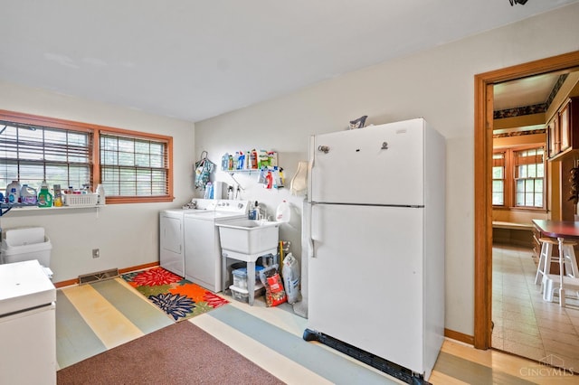 200 Santa Fe Rd, Middletown, OH 45042 - laundry area with separate washer and dryer and plenty of natural light