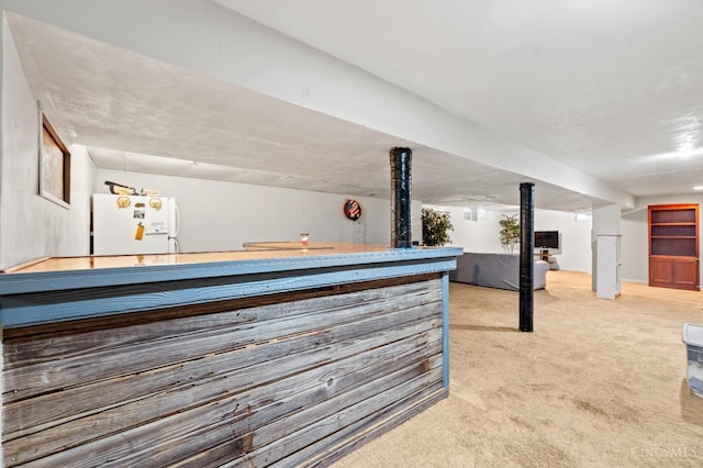 200 Santa Fe Rd, Middletown, OH 45042 - indoor dry bar with freestanding refrigerator and light carpet