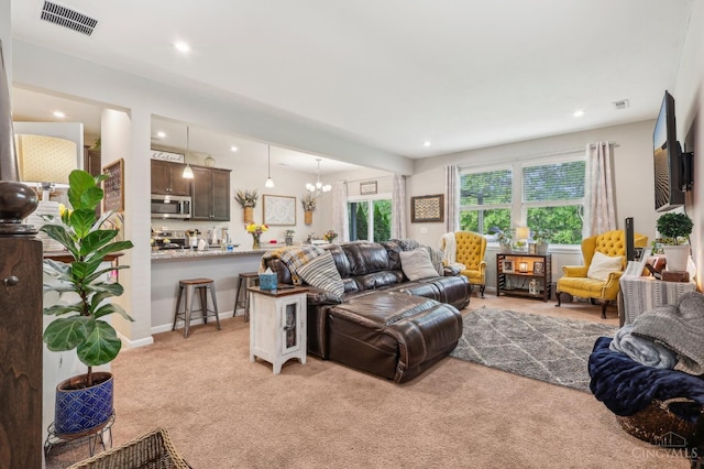 5859 Parkview Ln, Miami Twp, OH 45150 - living area featuring light colored carpet, a chandelier, and recessed lighting