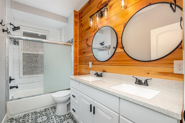 4226 Chambers St, Cincinnati, OH 45223 - full bathroom with double vanity, toilet, enclosed tub / shower combo, and tile patterned flooring