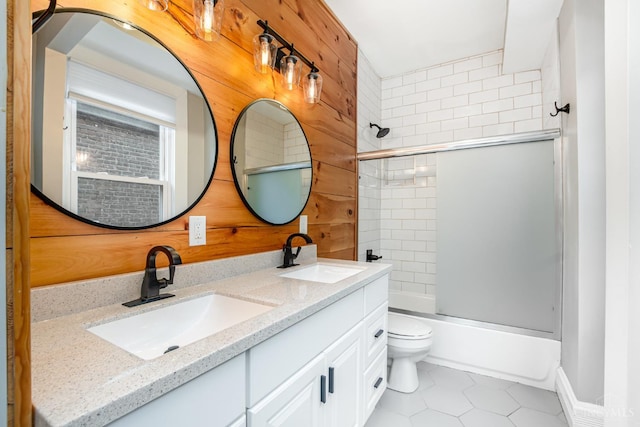 4226 Chambers St, Cincinnati, OH 45223 - bathroom featuring double vanity, tile patterned floors, toilet, and shower / washtub combination