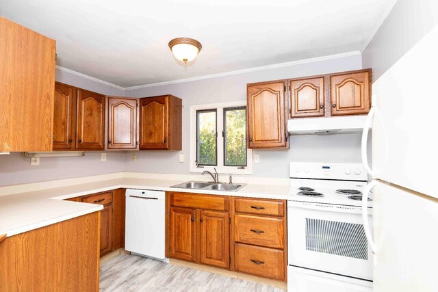 6785 Marvin Ave, North College Hill, OH 45224 - kitchen featuring white appliances, under cabinet range hood, a sink, brown cabinets, and ornamental molding