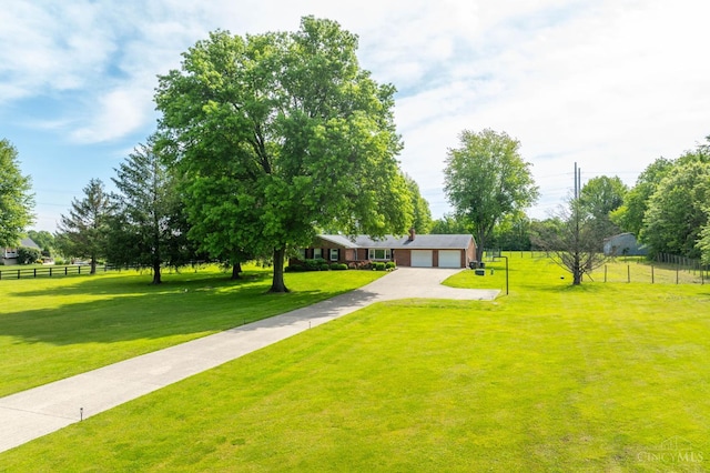 6290 Ludlum Rd, Salem Twp, OH 45152 - view of front facade with driveway and a garage