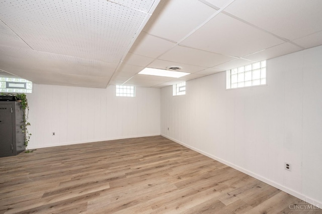 6290 Ludlum Rd, Salem Twp, OH 45152 - below grade area featuring wood finished floors, baseboards, and a drop ceiling