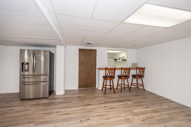 6290 Ludlum Rd, Salem Twp, OH 45152 - interior space with stainless steel refrigerator with ice dispenser and wood finished floors