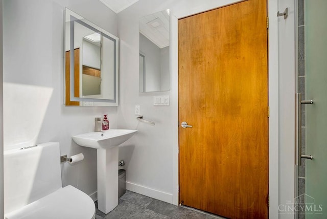 4723 Rosedale Rd, Middletown, OH 45042 - bathroom with toilet, baseboards, and a sink