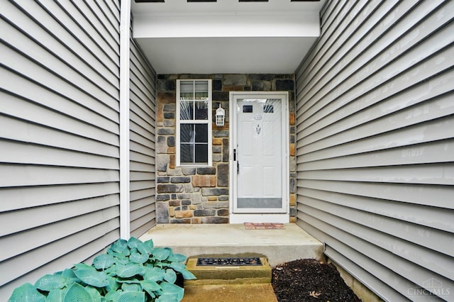 6872 Sandharbor Ct, Hamilton Twp, OH 45039 - property entrance with stone siding