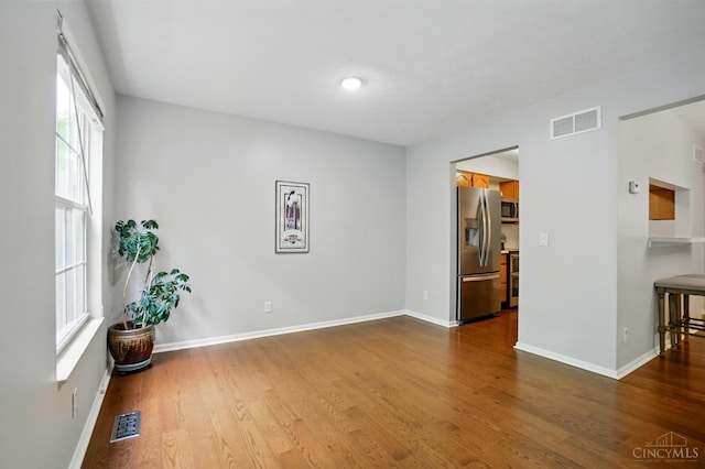 6872 Sandharbor Ct, Hamilton Twp, OH 45039 - spare room with dark wood-style flooring and baseboards