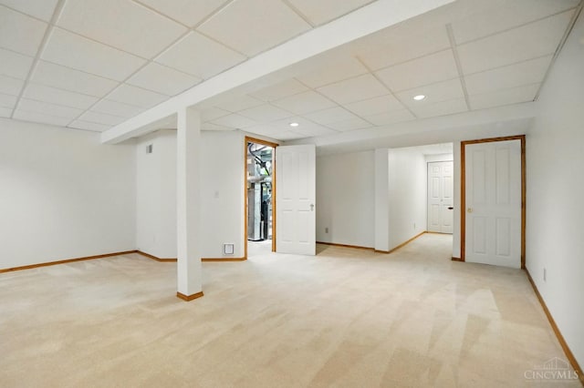 6872 Sandharbor Ct, Hamilton Twp, OH 45039 - below grade area with light colored carpet, baseboards, a drop ceiling, and recessed lighting