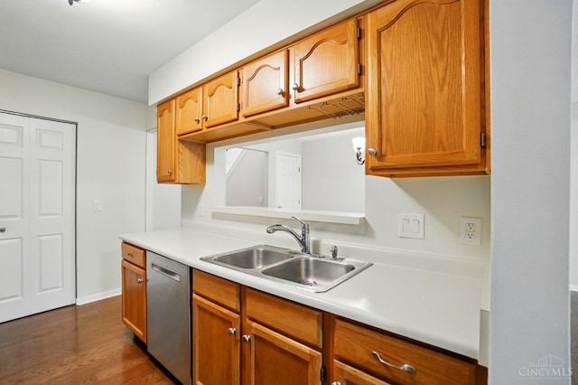 6872 Sandharbor Ct, Hamilton Twp, OH 45039 - kitchen with dishwasher, a sink, light countertops, dark wood-type flooring, and baseboards