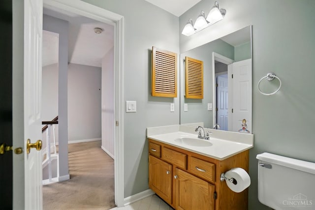 6872 Sandharbor Ct, Hamilton Twp, OH 45039 - bathroom featuring vanity, toilet, and baseboards