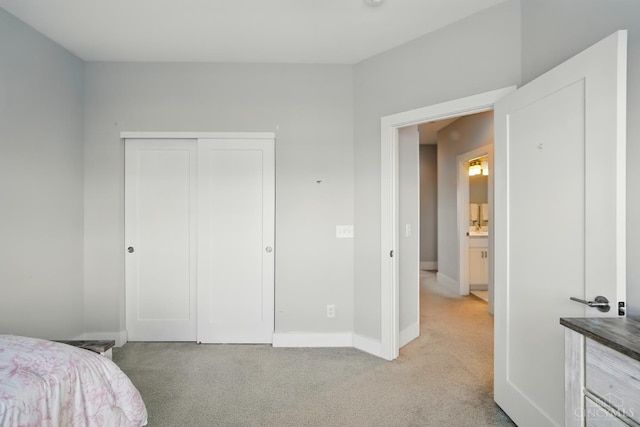 9276 Beacon St, Deerfield Twp, OH 45040 - bedroom with light carpet, a closet, and baseboards