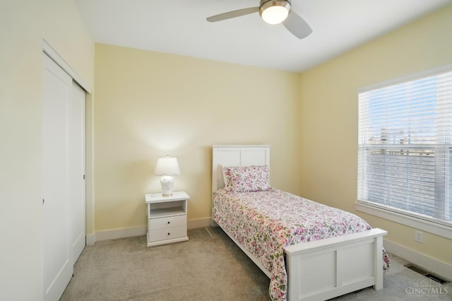 9276 Beacon St, Deerfield Twp, OH 45040 - bedroom with light carpet, baseboards, a closet, and ceiling fan
