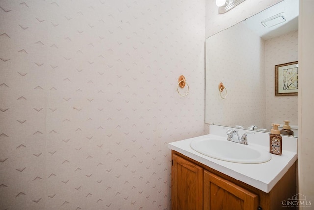 4634 Courtwood Cir, Union Twp, OH 45103 - bathroom with wallpapered walls and vanity