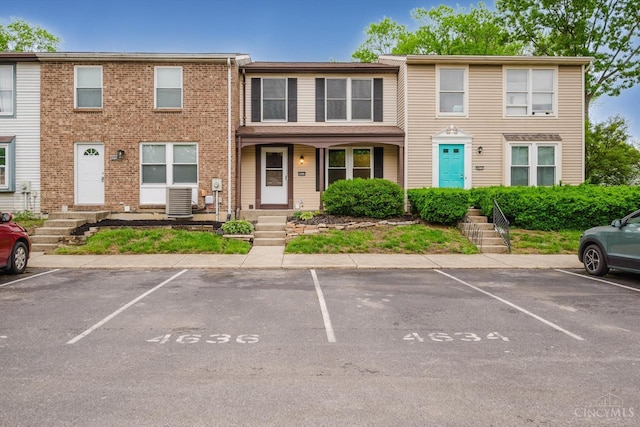 4634 Courtwood Cir, Union Twp, OH 45103 - view of property featuring uncovered parking and central air condition unit