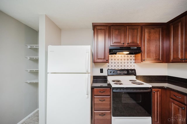 4634 Courtwood Cir, Union Twp, OH 45103 - kitchen with freestanding refrigerator, under cabinet range hood, electric range oven, dark countertops, and baseboards