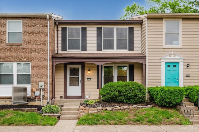 4634 Courtwood Cir, Union Twp, OH 45103 - multi unit property featuring cooling unit, covered porch, and brick siding