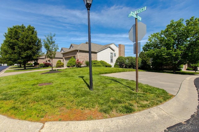 6260 Lake Front, Mason, OH 45040 - view of front of home with a front yard and brick siding