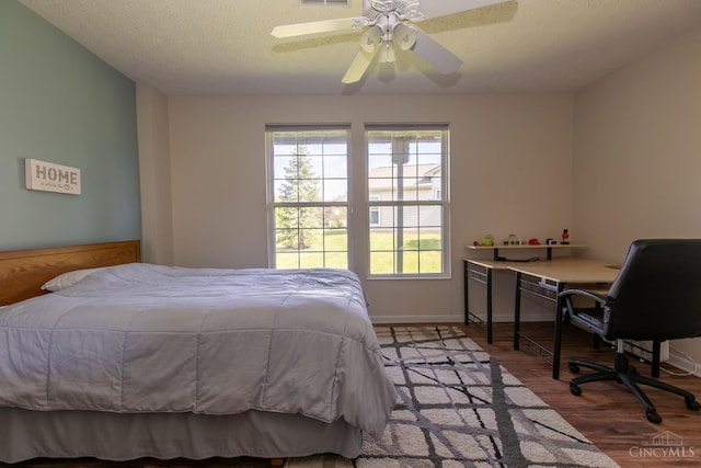 6260 Lake Front, Mason, OH 45040 - bedroom with wood finished floors, a textured ceiling, ceiling fan, and baseboards