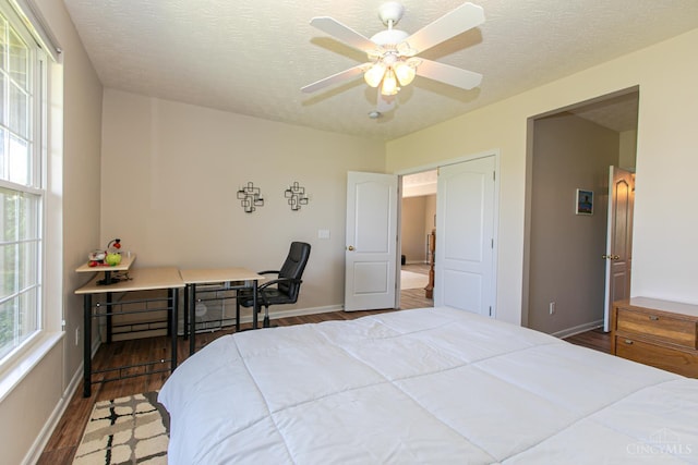 6260 Lake Front, Mason, OH 45040 - bedroom with wood finished floors, baseboards, and a ceiling fan
