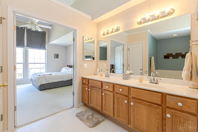 6260 Lake Front, Mason, OH 45040 - ensuite bathroom featuring double vanity, a ceiling fan, tile patterned floors, and crown molding