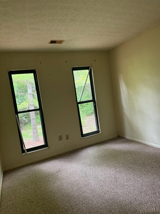 380 Walnut Ln, Mason, OH 45040 - carpeted spare room with a textured ceiling and baseboards