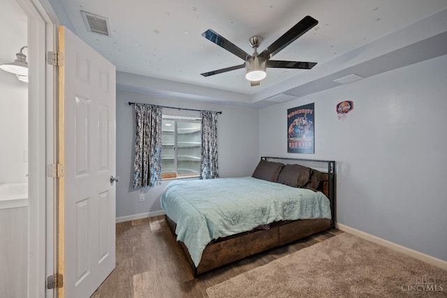 2489 Swings Corner Pt Isabel Rd, Tate Twp, OH 45106 - bedroom with baseboards, wood finished floors, and ceiling fan