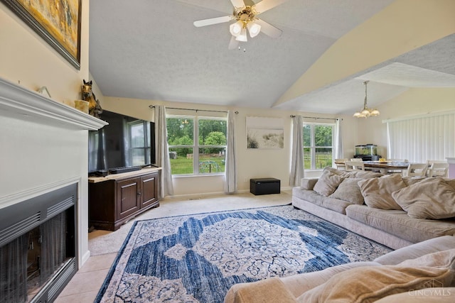 2489 Swings Corner Pt Isabel Rd, Tate Twp, OH 45106 - living room with vaulted ceiling, a chandelier, a textured ceiling, a ceiling fan, and light carpet