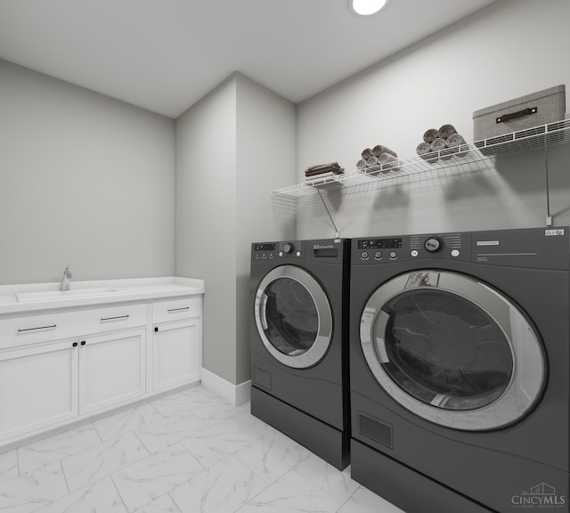 5003 Anderson Pl Unit 7, Cincinnati, OH 45227 - laundry room with independent washer and dryer, light marble finish floors, cabinet space, and baseboards