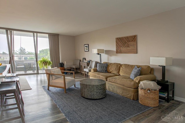 2324 Madison Rd Unit 506, Cincinnati, OH 45208 - living area with expansive windows and wood finished floors